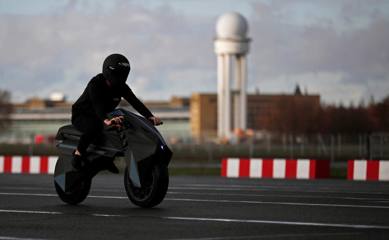 A motorcycle Unborn baby, Yourself, A spine axis, Prosthetic hand, Prosthetic forearm, A toucan beak, Ice cream, A chocolate beer bottle, A bicycle, A motorcycle, Aircraft seats, Plastic working handguns, Adidas shoes, Office space