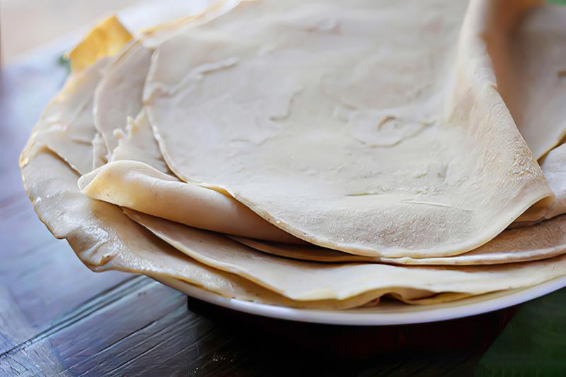 Gorraasa (Sudan) Tagine (Morocco, Tunisia, Algeria), Bazin (Libya), Banku (Ghana), Chakalaka (South Africa), Akara (West Africa), Haraimi (Libya), Bunny Chow (South Africa), Zanzibar pizza (Tanzania), Braai (South Africa), Suya (Nigeria), Injera (Ethiopia, Eritrea), Mafe (West Africa), Pastilla (Morocco), Doro Wat (Ethiopia), Fufu (West Africa), Gorraasa (Sudan)