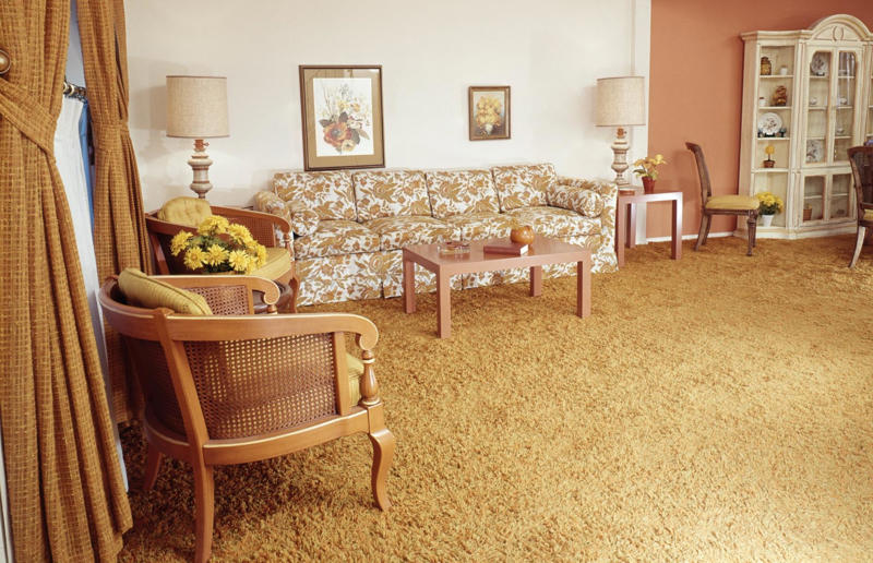 1970s homewares that have disappeared from our homes, Beanbags, Wood panelling, Avocado bathroom suites, Carpeted bathrooms, Linoleum floors, Boxy TVs, Brick fireplaces, Patterned carpet, Alarm clocks, Patterned wallpaper, Conversation pits, Floral sofas, Push button phones, Stereo systems, Fringing on furniture, Electric carving knives, Waterbeds, Fondue sets, Brass ornaments, Velvet everywhere, Zebra rugs