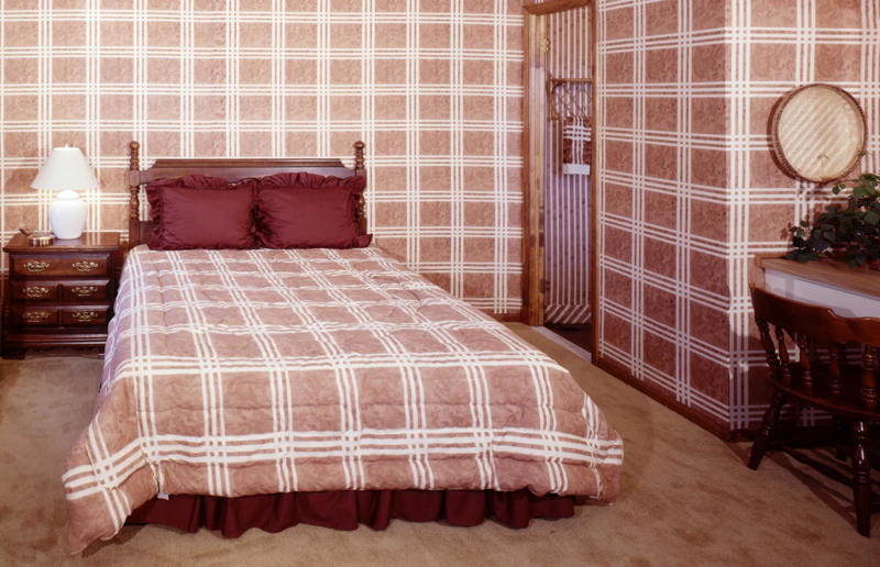 1970s homewares that have disappeared from our homes, Beanbags, Wood panelling, Avocado bathroom suites, Carpeted bathrooms, Linoleum floors, Boxy TVs, Brick fireplaces, Patterned carpet, Alarm clocks, Patterned wallpaper, Conversation pits, Floral sofas, Push button phones, Stereo systems, Fringing on furniture, Electric carving knives, Waterbeds, Fondue sets, Brass ornaments, Velvet everywhere, Zebra rugs