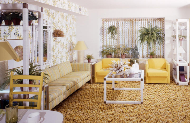 1970s homewares that have disappeared from our homes, Beanbags, Wood panelling, Avocado bathroom suites, Carpeted bathrooms, Linoleum floors, Boxy TVs, Brick fireplaces, Patterned carpet, Alarm clocks, Patterned wallpaper, Conversation pits, Floral sofas, Push button phones, Stereo systems, Fringing on furniture, Electric carving knives, Waterbeds, Fondue sets, Brass ornaments, Velvet everywhere, Zebra rugs