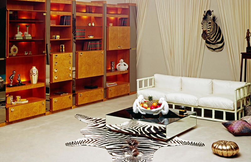 1970s homewares that have disappeared from our homes, Beanbags, Wood panelling, Avocado bathroom suites, Carpeted bathrooms, Linoleum floors, Boxy TVs, Brick fireplaces, Patterned carpet, Alarm clocks, Patterned wallpaper, Conversation pits, Floral sofas, Push button phones, Stereo systems, Fringing on furniture, Electric carving knives, Waterbeds, Fondue sets, Brass ornaments, Velvet everywhere, Zebra rugs