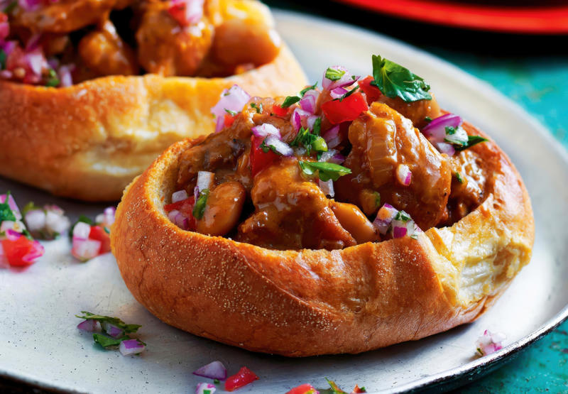 Bunny Chow (South Africa) Tagine (Morocco, Tunisia, Algeria), Bazin (Libya), Banku (Ghana), Chakalaka (South Africa), Akara (West Africa), Haraimi (Libya), Bunny Chow (South Africa), Zanzibar pizza (Tanzania), Braai (South Africa), Suya (Nigeria), Injera (Ethiopia, Eritrea), Mafe (West Africa), Pastilla (Morocco), Doro Wat (Ethiopia), Fufu (West Africa), Gorraasa (Sudan)