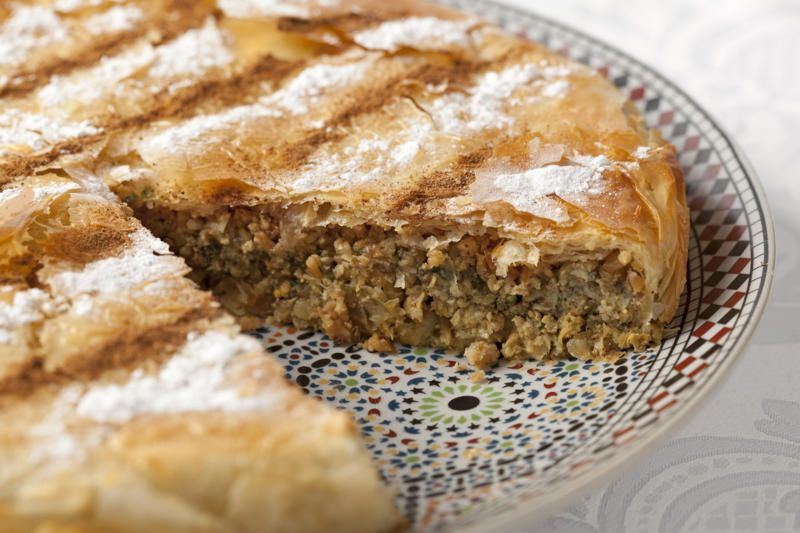 Pastilla (Morocco) Tagine (Morocco, Tunisia, Algeria), Bazin (Libya), Banku (Ghana), Chakalaka (South Africa), Akara (West Africa), Haraimi (Libya), Bunny Chow (South Africa), Zanzibar pizza (Tanzania), Braai (South Africa), Suya (Nigeria), Injera (Ethiopia, Eritrea), Mafe (West Africa), Pastilla (Morocco), Doro Wat (Ethiopia), Fufu (West Africa), Gorraasa (Sudan)