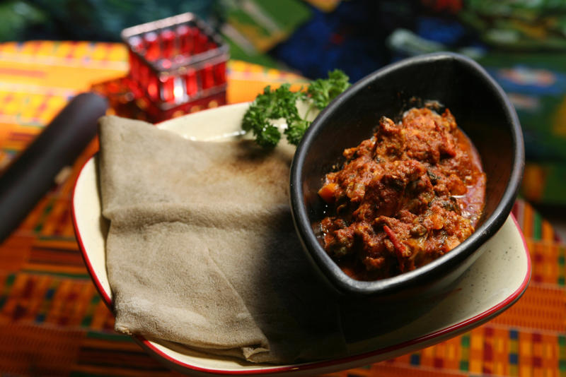 Doro Wat (Ethiopia) Tagine (Morocco, Tunisia, Algeria), Bazin (Libya), Banku (Ghana), Chakalaka (South Africa), Akara (West Africa), Haraimi (Libya), Bunny Chow (South Africa), Zanzibar pizza (Tanzania), Braai (South Africa), Suya (Nigeria), Injera (Ethiopia, Eritrea), Mafe (West Africa), Pastilla (Morocco), Doro Wat (Ethiopia), Fufu (West Africa), Gorraasa (Sudan)