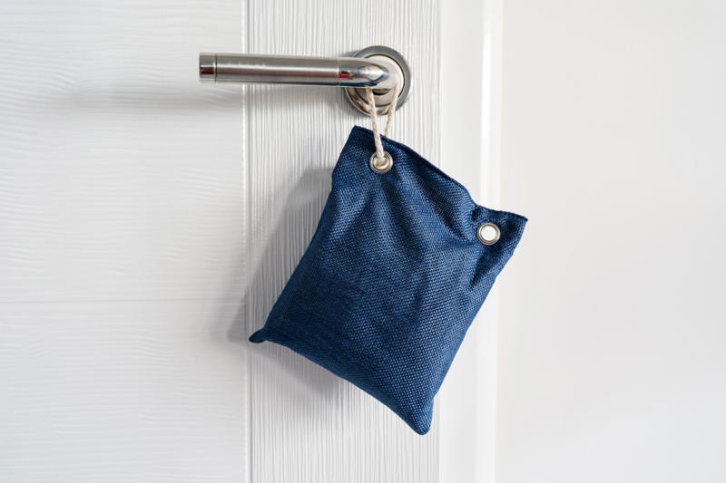 Try placing charcoal bags around your home What is pet smell, exactly?, Dog smell, Dog odors are by design, You'll need to clean more often than people who don't have pets, Some dog smells indicate health problems, Baking soda, Couches and upholstery, Leather furniture, Remove pet odors from the air, Use a diffuser, Get rid of dog mess smells, Bathe and groom your dog regularly, Keep up with your dog’s hygiene, Wash your dog's items, Create a relaxed environment, How to get rid of wet dog smell without a bath, Increase airflow, Get an odor-free litter box, Groom your cat, Keep an odor-free cage, Why is cat smell so hard to remove?, Try enzymatic cleaners, Never mix hydrogen peroxide and vinegar to treat a stain, Try placing charcoal bags around your home