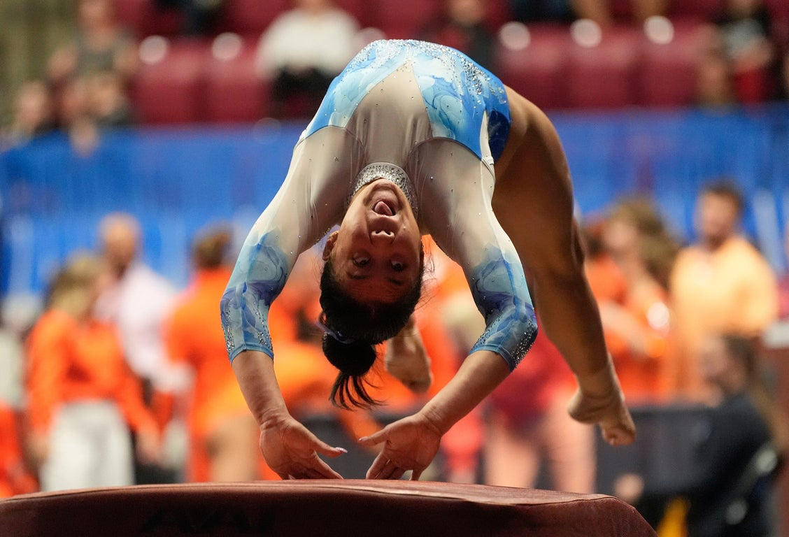 Memorable photos feature top collegiate women's gymnasts in action