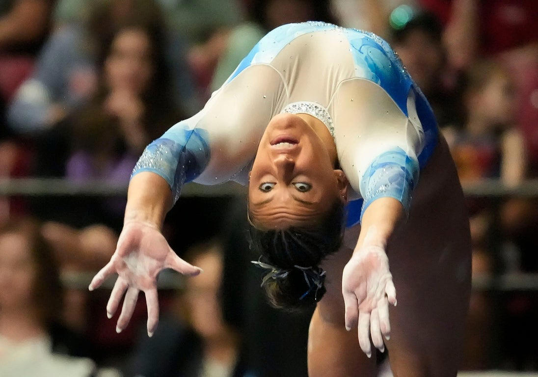 Memorable photos feature top collegiate women's gymnasts in action