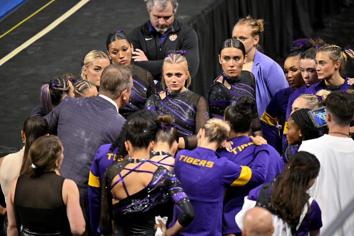 Moving photos capture triumph and heartbreak during women's gymnastics semifinal