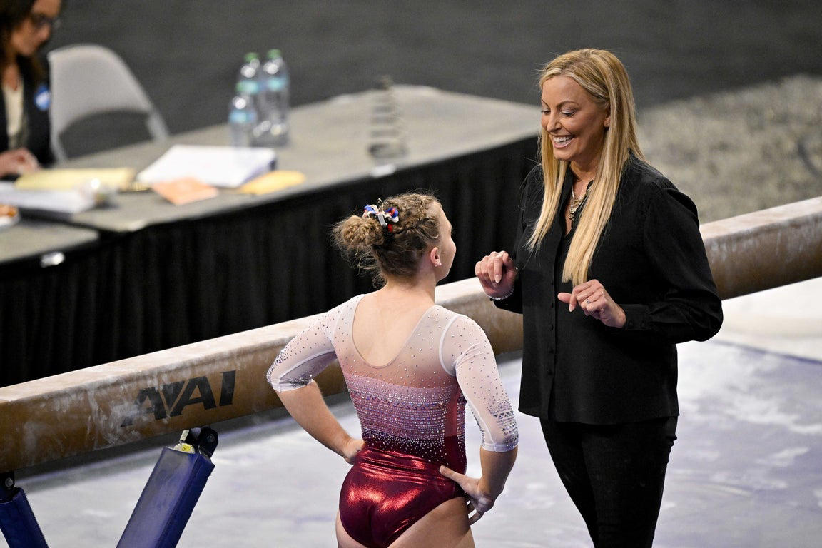 Moving photos capture triumph and heartbreak during women's gymnastics semifinal