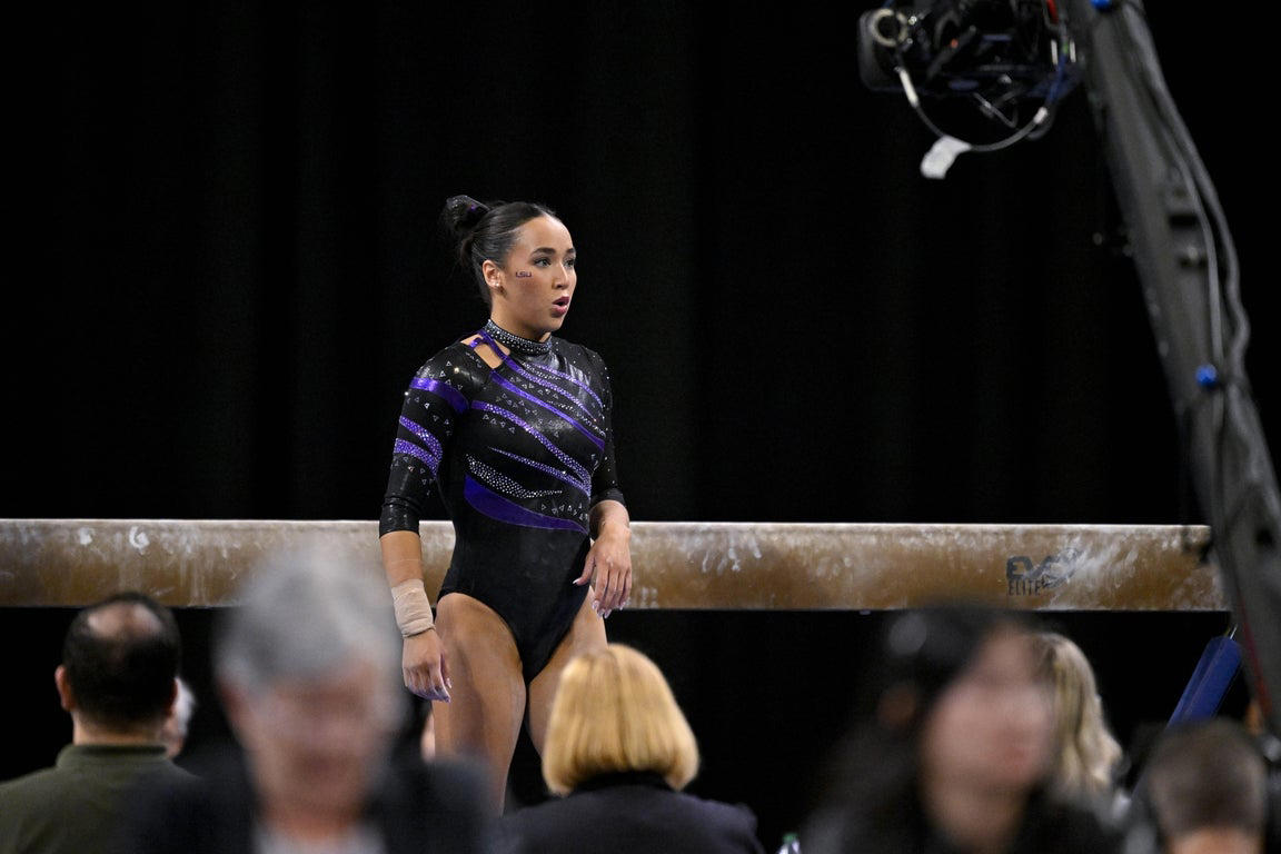 Moving photos capture triumph and heartbreak during women's gymnastics semifinal