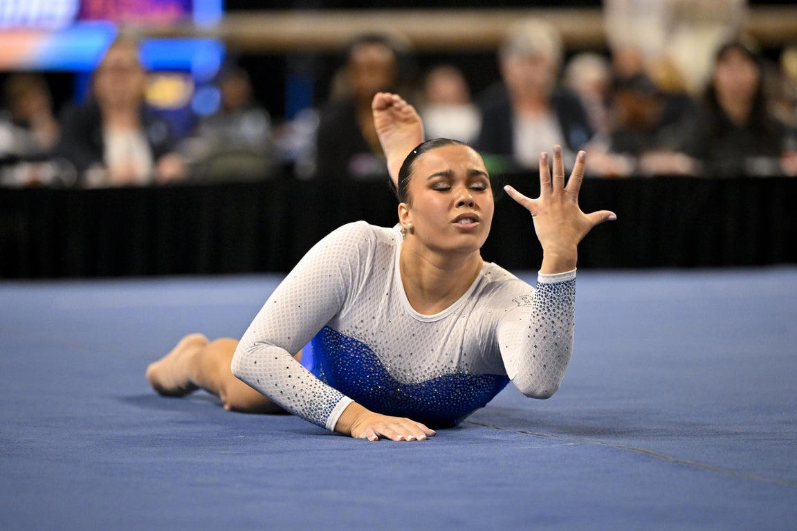 Moving photos capture triumph and heartbreak during women's gymnastics semifinal
