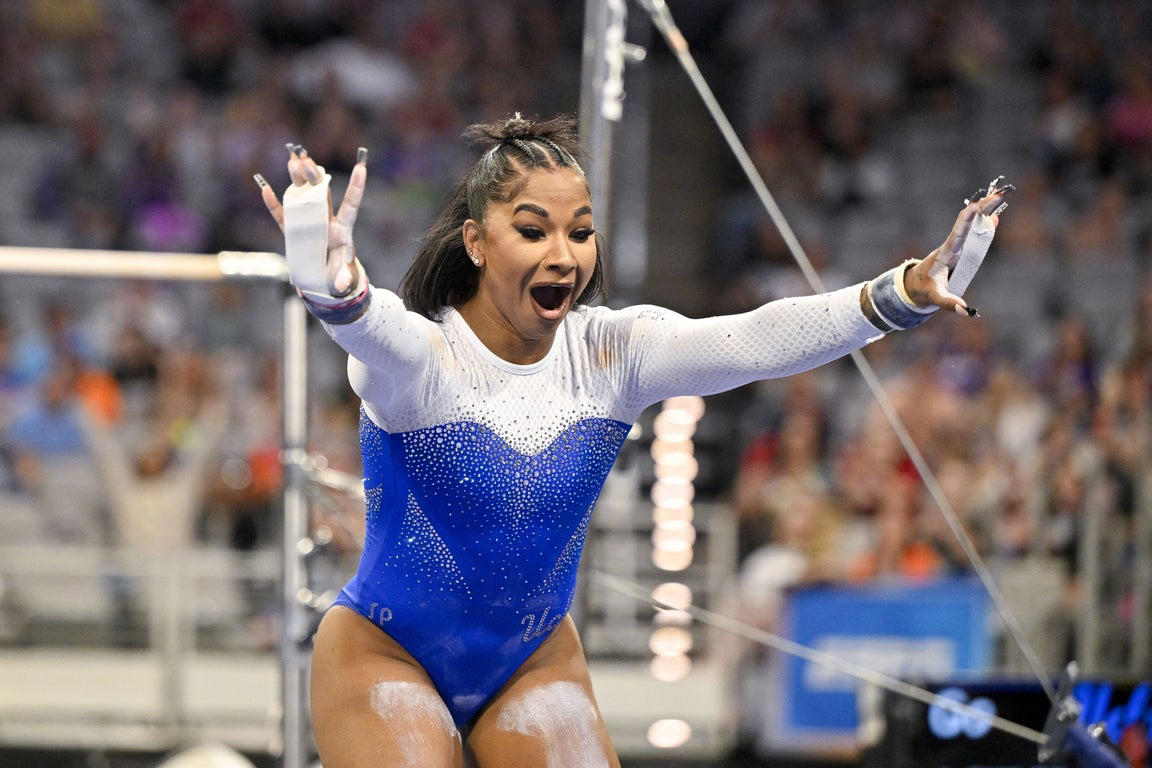 Moving photos capture triumph and heartbreak during women's gymnastics semifinal