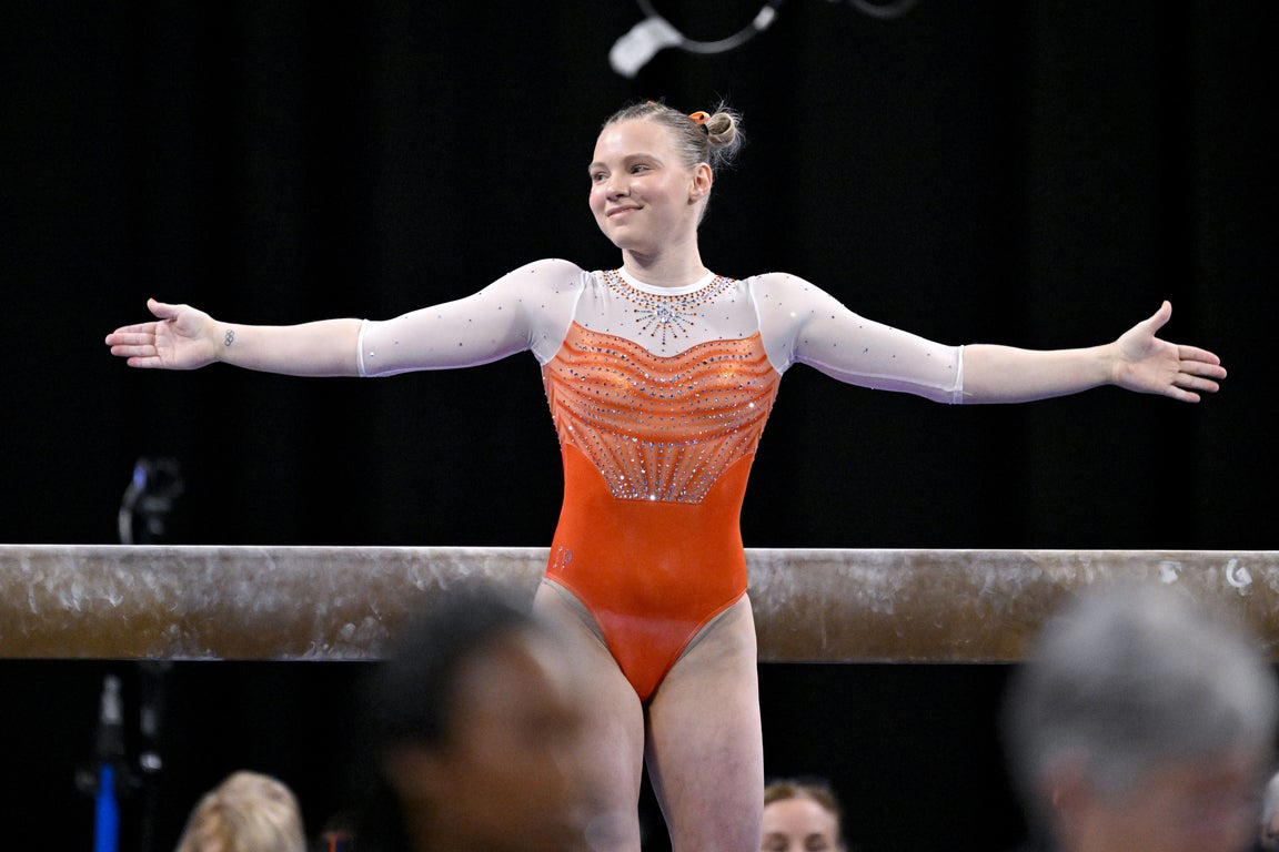 Moving photos capture triumph and heartbreak during women's gymnastics semifinal