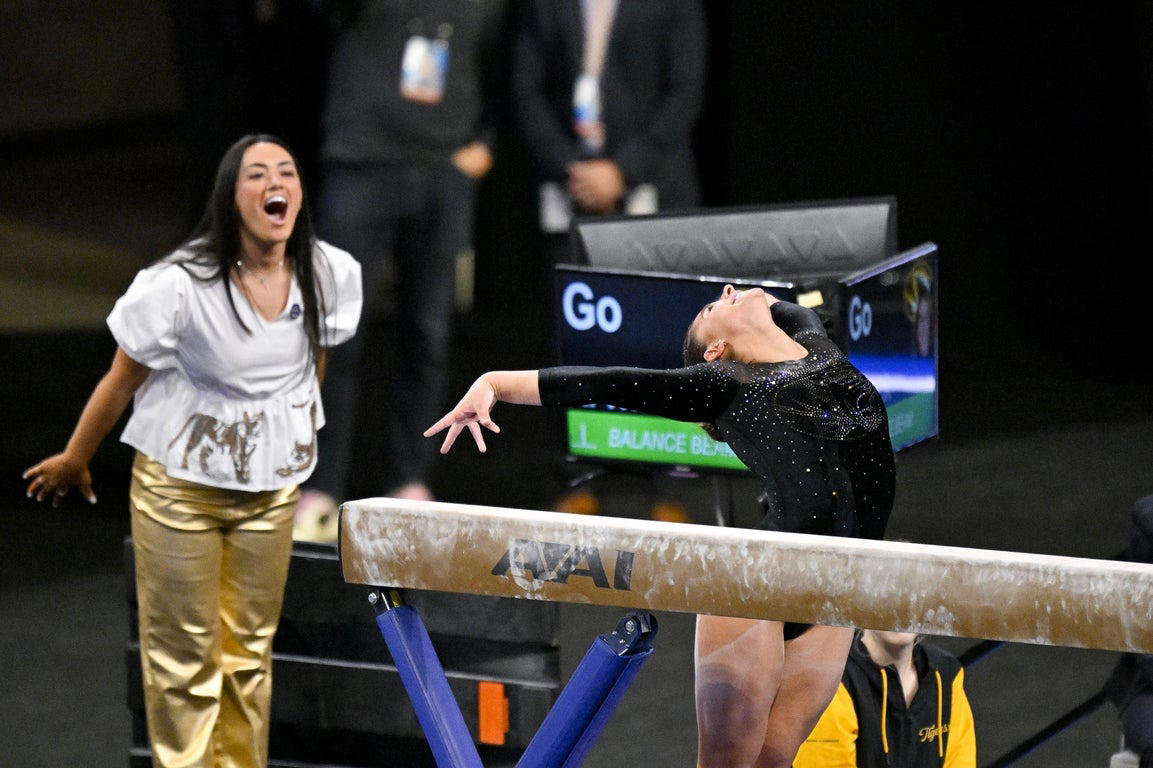 Moving photos capture triumph and heartbreak during women's gymnastics semifinal