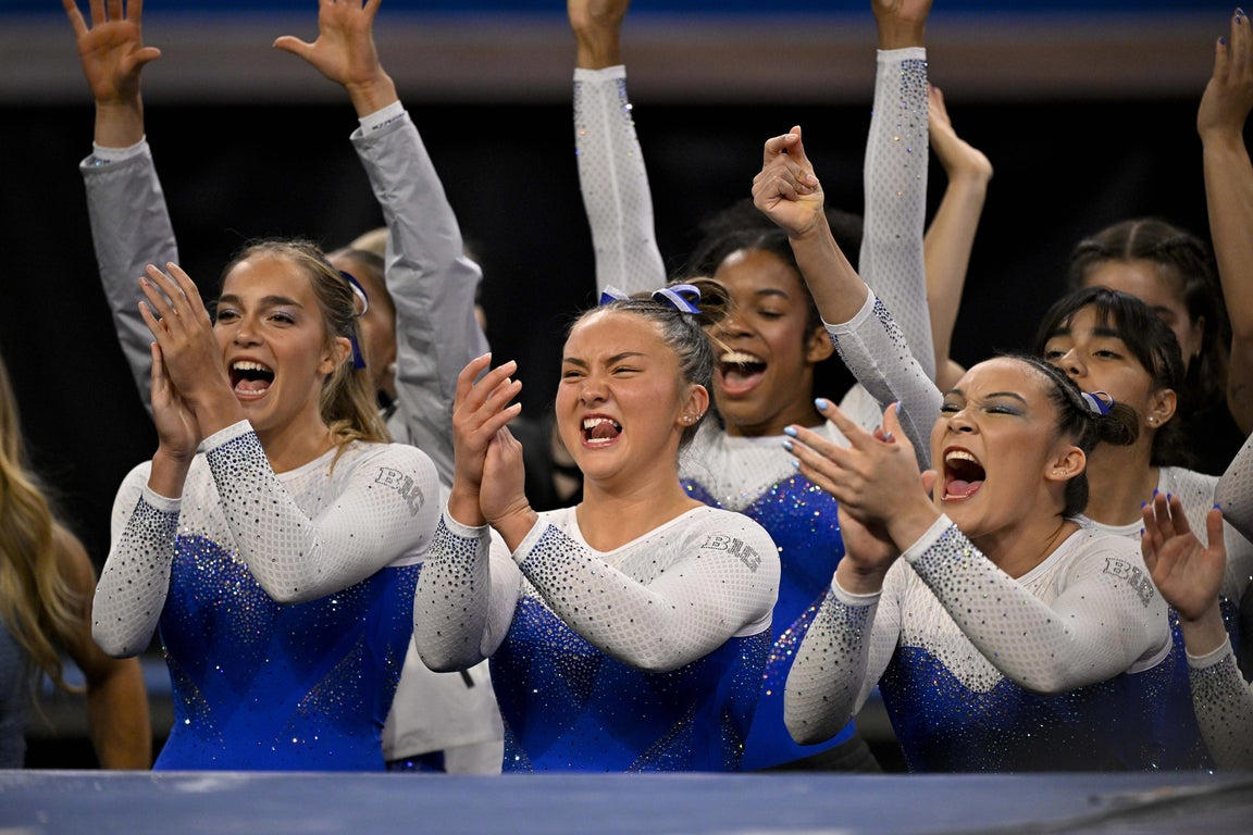 Moving photos capture triumph and heartbreak during women's gymnastics semifinal
