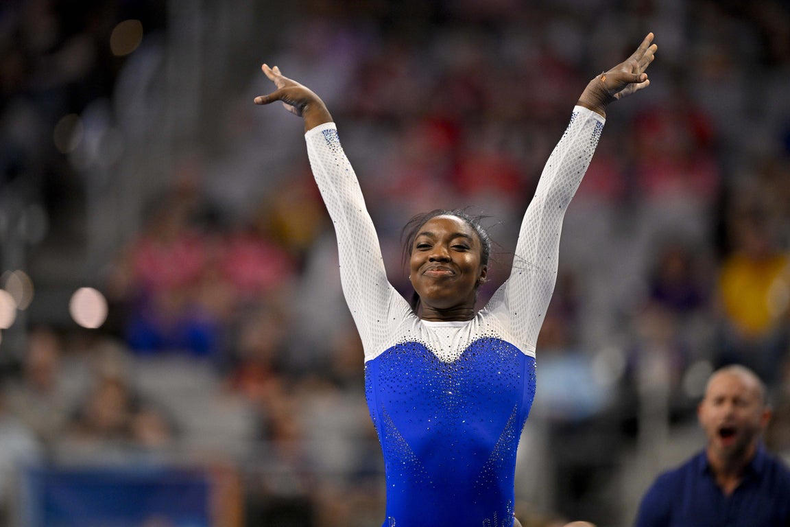 Moving photos capture triumph and heartbreak during women's gymnastics semifinal