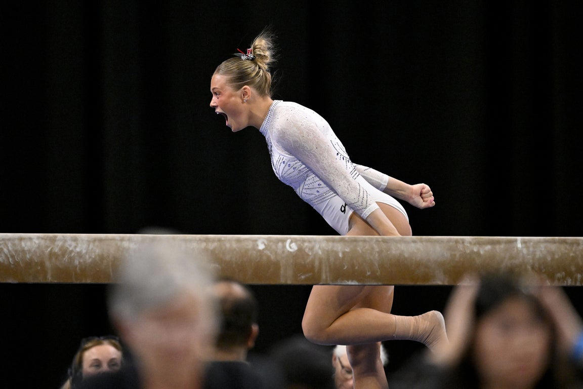 Moving photos capture triumph and heartbreak during women's gymnastics semifinal
