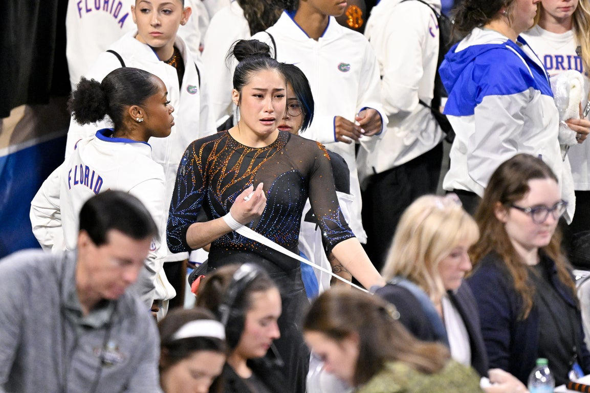 Moving photos capture triumph and heartbreak during women's gymnastics semifinal