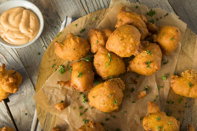 Hush puppies Hush puppies, French fries, Fried green tomatoes, Banh cam, Tostones, Fried chicken, Chimichangas, Chicharrón, Maakouda, Spring rolls, Fish and chips