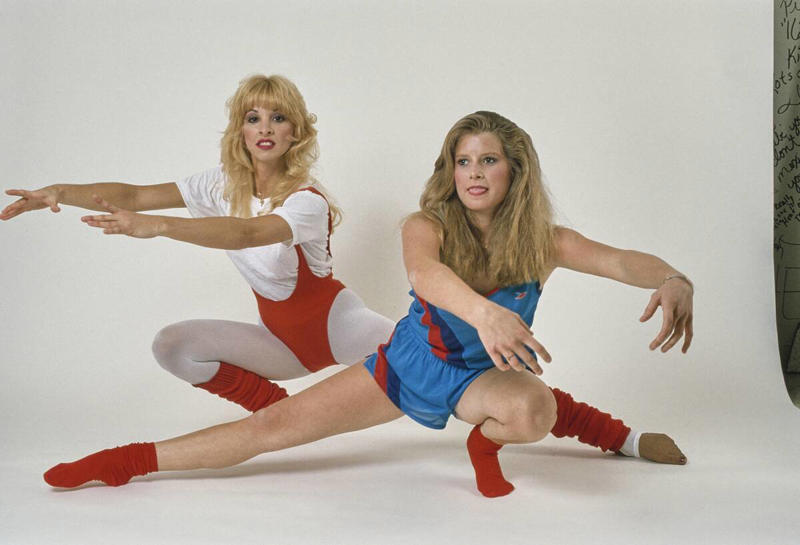 Tights And Leotards Vivid Colors, Early Hip Hop Styles, Big Hair, The Post-punk Aesthetic, Turtlenecks, Friends Wearing Matching Outfits, The Jazzercise Look, Shoulder Pads Fit For Linebackers, Jeans And Pants With High Waistlines, Stark Black and White, Short Shorts, Tights And Leotards, Streamlined Athletic Attire, Off-The-Shoulders Tops, Leggings For Aerobics And Style, Spiky Women's Hair, Sequinned Wardrobes, Tassels On Everything, The New York Aesthetic, T-Shirts With Graphics, Gigantic Sunglasses, Big Hair and Pastels, Fashion Gloves, Leather Dresses, Louis Vuitton Jackets And Accessories, Pop Music Went Punk, Cowboy Boots Worn Off The Ranch, Lingerie Worn As Part Of An Outfit, Gawdy Pearls And Jewelry, Real And Faux Feathers, Pouffy and Puffy Accessories, 2-Piece Skirt Suits, Preppy Dressing, Thick Belts With Mini Skirts, Double Blue Denim Outfits, High Top Sneakers And Thick Socks, Acid-Wash Jeans, Fingerless Neon Gloves, Scrunchies, Oversized Earrings In Bright Neon Colors, Ripped Knees On Jeans And Pants, Athletic Tops And Tanks, Knee-High Socks, Ankle Boots, Overalls, Track Suits And Windbreakers