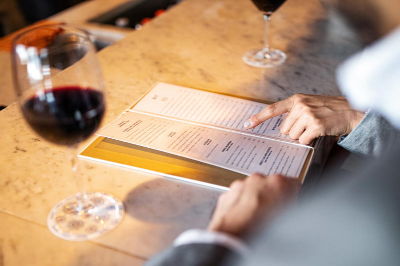 The dos and don’ts of bar etiquette, Asking them to do a shot with you, Picking up your drink before they give it to you, Cleaning up broken glass, Itemizing and splitting a tab, Stuffing napkins, straw wrappers or other trash into your cup, Telling them your life story, Asking them out, Reaching over or behind the bar to grab something quickly, Buying a round of drinks, Asking them to “surprise you” with a drink, Requesting a custom cocktail or ordering off-menu, Using beverage napkins to clean up a spill, Handing them a wad of cash, Getting creative with the tip, Not bothering them with safety concerns, Keeping things simple without a menu, About the experts, Why trust us