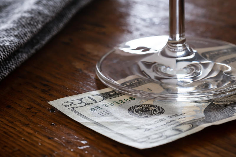 The dos and don’ts of bar etiquette, Asking them to do a shot with you, Picking up your drink before they give it to you, Cleaning up broken glass, Itemizing and splitting a tab, Stuffing napkins, straw wrappers or other trash into your cup, Telling them your life story, Asking them out, Reaching over or behind the bar to grab something quickly, Buying a round of drinks, Asking them to “surprise you” with a drink, Requesting a custom cocktail or ordering off-menu, Using beverage napkins to clean up a spill, Handing them a wad of cash, Getting creative with the tip, Not bothering them with safety concerns, Keeping things simple without a menu, About the experts, Why trust us