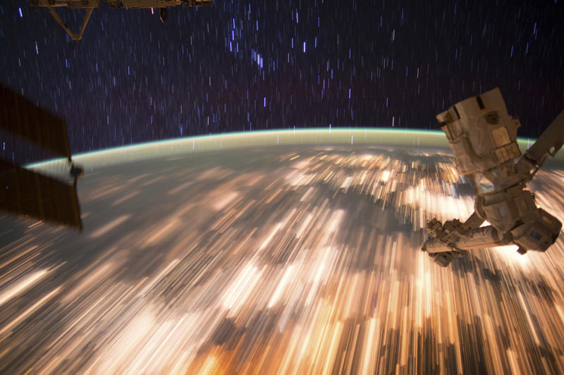 What 17,500 mph looks like A cosmic painting, Saturn's summer sunlight, A two-hour long solar flare, Twisted cosmic knot, An oldie but a goodie, ET goes home, The Great Red Spot, The Crab Nebula, A rare close-up of evidence of water on Mars, Meet Janus, Pandora, Enceladus, Rhea, and Mimas, A supermassive black hole, What 17,500 mph looks like, Jupiter's Northern Lights, Life on Mars, Mars is edgy, Stormy surface, Hurricane Irma from above, Superstar, Don't forget about Pluto!, Subtropical storms from space, The farthest individual star ever seen, Weird little things seen on Earth, Dwarf galaxy, Fires as seen from outer space, A cosmic sparkling ring, Views from the ISS, What outer space plasma looks like, You may recognize this from 'The Martian', Us, as seen from Saturn