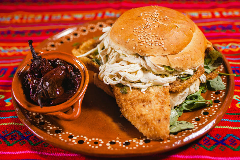 Cemita, Mexico Vegemite, Australia, Yakisoba-pan, Japan, Roti john, Malaysia/Singapore, Vada pav, India, Breakfast roll, Ireland, Kaya toast, Singapore, Francesinha, Portugal, Bocadillo, Spain, Zapiekanka, Poland, Katsu sando, Japan, Cemita, Mexico, Bauru, Brazil, Rarebit, Wales, Leberkäsesemmel, Germany, Bánh mì, Vietnam, Jambon-beurre, France, Falafel, across the Middle East, Arepa, Venezuela, Montreal-style smoked meat, Canada, Pork chop bun, Macau, Tripleta, Puerto Rico, Chivito, Uruguay, Medianoche, Cuba, Chopped barbecue, USA, Gyro, Greece