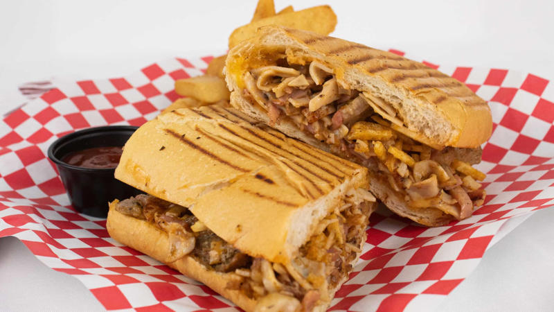 Tripleta, Puerto Rico Vegemite, Australia, Yakisoba-pan, Japan, Roti john, Malaysia/Singapore, Vada pav, India, Breakfast roll, Ireland, Kaya toast, Singapore, Francesinha, Portugal, Bocadillo, Spain, Zapiekanka, Poland, Katsu sando, Japan, Cemita, Mexico, Bauru, Brazil, Rarebit, Wales, Leberkäsesemmel, Germany, Bánh mì, Vietnam, Jambon-beurre, France, Falafel, across the Middle East, Arepa, Venezuela, Montreal-style smoked meat, Canada, Pork chop bun, Macau, Tripleta, Puerto Rico, Chivito, Uruguay, Medianoche, Cuba, Chopped barbecue, USA, Gyro, Greece