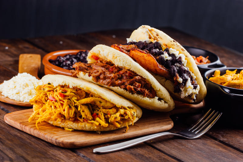 Arepa, Venezuela Vegemite, Australia, Yakisoba-pan, Japan, Roti john, Malaysia/Singapore, Vada pav, India, Breakfast roll, Ireland, Kaya toast, Singapore, Francesinha, Portugal, Bocadillo, Spain, Zapiekanka, Poland, Katsu sando, Japan, Cemita, Mexico, Bauru, Brazil, Rarebit, Wales, Leberkäsesemmel, Germany, Bánh mì, Vietnam, Jambon-beurre, France, Falafel, across the Middle East, Arepa, Venezuela, Montreal-style smoked meat, Canada, Pork chop bun, Macau, Tripleta, Puerto Rico, Chivito, Uruguay, Medianoche, Cuba, Chopped barbecue, USA, Gyro, Greece