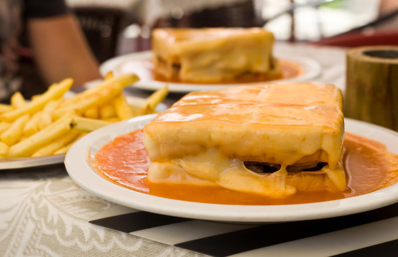 Francesinha, Portugal Vegemite, Australia, Yakisoba-pan, Japan, Roti john, Malaysia/Singapore, Vada pav, India, Breakfast roll, Ireland, Kaya toast, Singapore, Francesinha, Portugal, Bocadillo, Spain, Zapiekanka, Poland, Katsu sando, Japan, Cemita, Mexico, Bauru, Brazil, Rarebit, Wales, Leberkäsesemmel, Germany, Bánh mì, Vietnam, Jambon-beurre, France, Falafel, across the Middle East, Arepa, Venezuela, Montreal-style smoked meat, Canada, Pork chop bun, Macau, Tripleta, Puerto Rico, Chivito, Uruguay, Medianoche, Cuba, Chopped barbecue, USA, Gyro, Greece