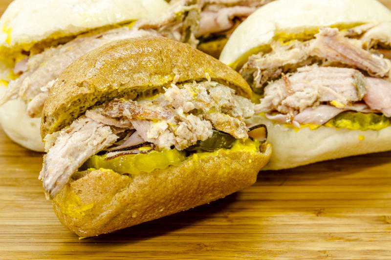 Medianoche, Cuba Vegemite, Australia, Yakisoba-pan, Japan, Roti john, Malaysia/Singapore, Vada pav, India, Breakfast roll, Ireland, Kaya toast, Singapore, Francesinha, Portugal, Bocadillo, Spain, Zapiekanka, Poland, Katsu sando, Japan, Cemita, Mexico, Bauru, Brazil, Rarebit, Wales, Leberkäsesemmel, Germany, Bánh mì, Vietnam, Jambon-beurre, France, Falafel, across the Middle East, Arepa, Venezuela, Montreal-style smoked meat, Canada, Pork chop bun, Macau, Tripleta, Puerto Rico, Chivito, Uruguay, Medianoche, Cuba, Chopped barbecue, USA, Gyro, Greece