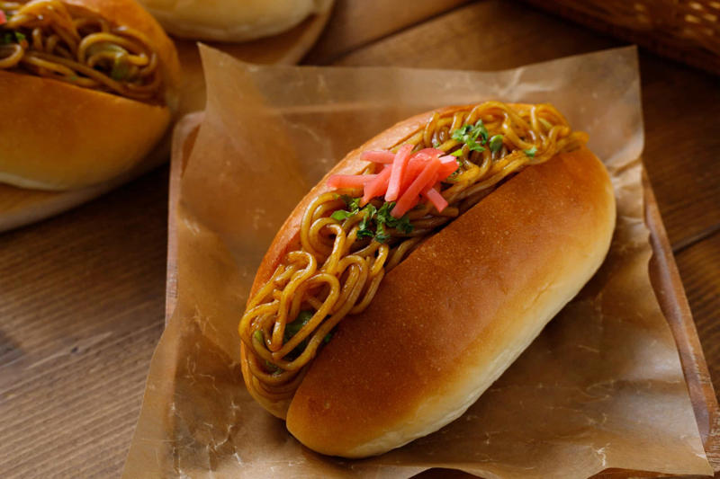 Yakisoba-pan, Japan Vegemite, Australia, Yakisoba-pan, Japan, Roti john, Malaysia/Singapore, Vada pav, India, Breakfast roll, Ireland, Kaya toast, Singapore, Francesinha, Portugal, Bocadillo, Spain, Zapiekanka, Poland, Katsu sando, Japan, Cemita, Mexico, Bauru, Brazil, Rarebit, Wales, Leberkäsesemmel, Germany, Bánh mì, Vietnam, Jambon-beurre, France, Falafel, across the Middle East, Arepa, Venezuela, Montreal-style smoked meat, Canada, Pork chop bun, Macau, Tripleta, Puerto Rico, Chivito, Uruguay, Medianoche, Cuba, Chopped barbecue, USA, Gyro, Greece