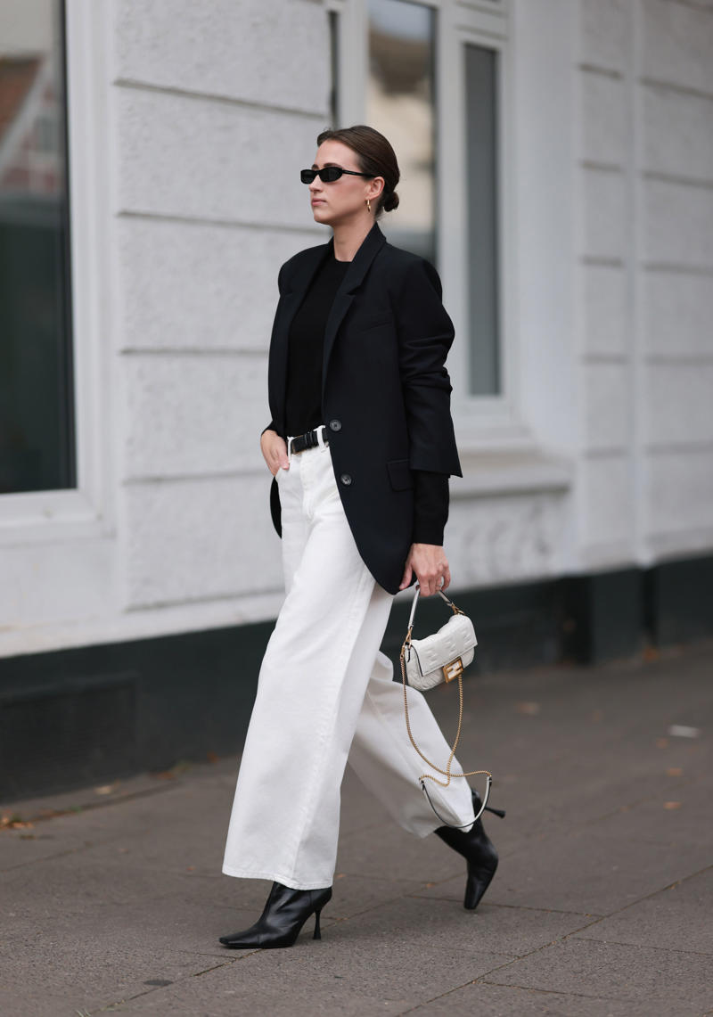 1. With a blazer, 2. An all-white ensemble, 3. With a leather jacket, 4. A casual cardigan, 5. With a button-down, 6. With platform shoes, 7. With butter yellow, 8. With animal prints, 9. With a trench coat, 10. With riding boots, 11. With a fitted top