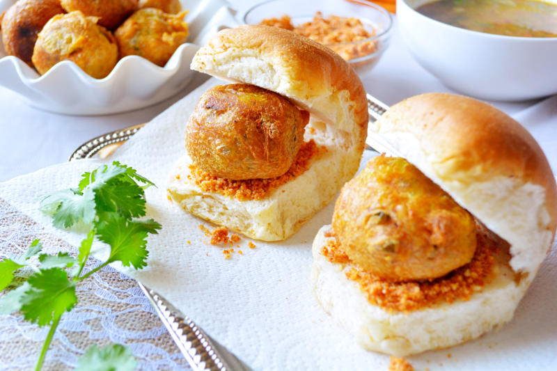 Vada pav, India Vegemite, Australia, Yakisoba-pan, Japan, Roti john, Malaysia/Singapore, Vada pav, India, Breakfast roll, Ireland, Kaya toast, Singapore, Francesinha, Portugal, Bocadillo, Spain, Zapiekanka, Poland, Katsu sando, Japan, Cemita, Mexico, Bauru, Brazil, Rarebit, Wales, Leberkäsesemmel, Germany, Bánh mì, Vietnam, Jambon-beurre, France, Falafel, across the Middle East, Arepa, Venezuela, Montreal-style smoked meat, Canada, Pork chop bun, Macau, Tripleta, Puerto Rico, Chivito, Uruguay, Medianoche, Cuba, Chopped barbecue, USA, Gyro, Greece
