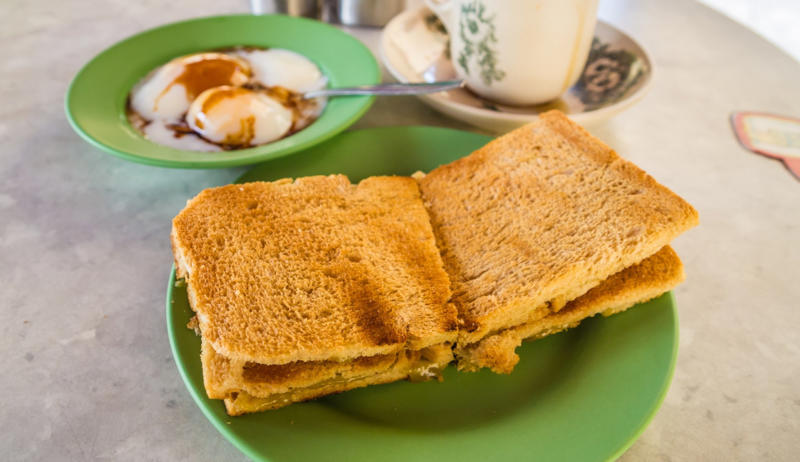 Kaya toast, Singapore Vegemite, Australia, Yakisoba-pan, Japan, Roti john, Malaysia/Singapore, Vada pav, India, Breakfast roll, Ireland, Kaya toast, Singapore, Francesinha, Portugal, Bocadillo, Spain, Zapiekanka, Poland, Katsu sando, Japan, Cemita, Mexico, Bauru, Brazil, Rarebit, Wales, Leberkäsesemmel, Germany, Bánh mì, Vietnam, Jambon-beurre, France, Falafel, across the Middle East, Arepa, Venezuela, Montreal-style smoked meat, Canada, Pork chop bun, Macau, Tripleta, Puerto Rico, Chivito, Uruguay, Medianoche, Cuba, Chopped barbecue, USA, Gyro, Greece