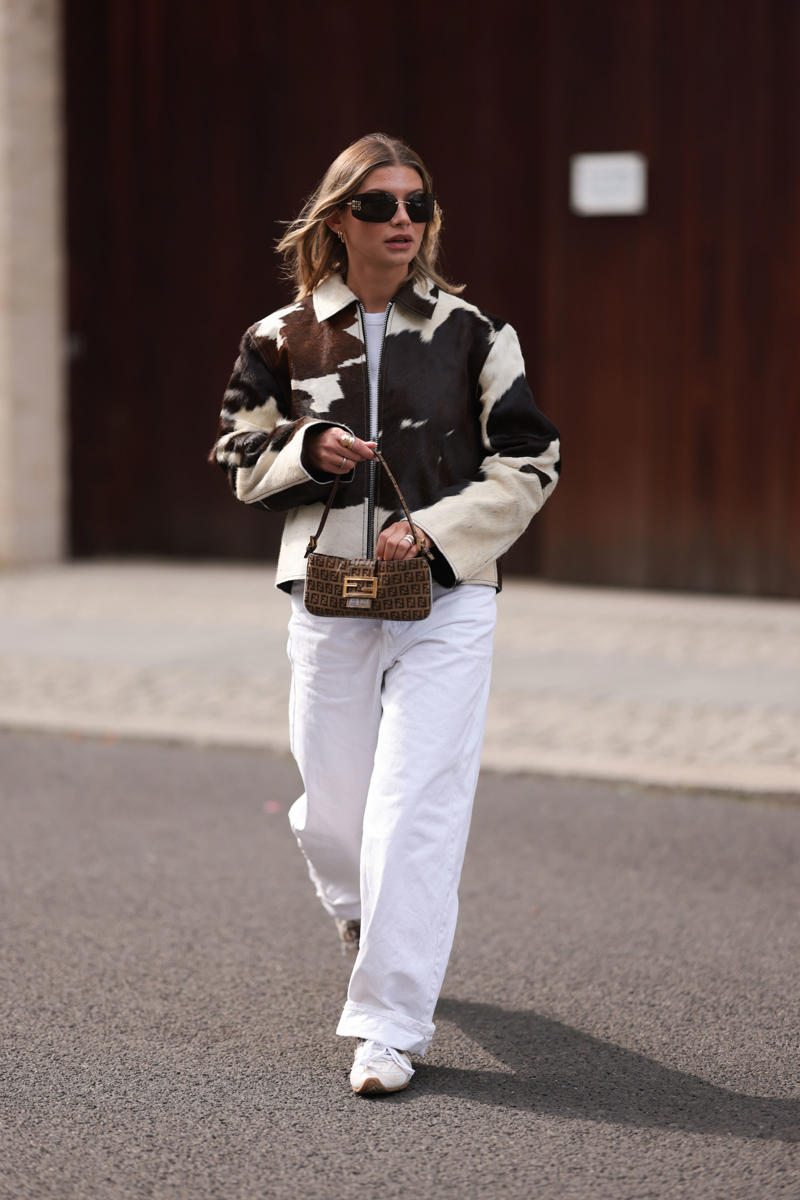 1. With a blazer, 2. An all-white ensemble, 3. With a leather jacket, 4. A casual cardigan, 5. With a button-down, 6. With platform shoes, 7. With butter yellow, 8. With animal prints, 9. With a trench coat, 10. With riding boots, 11. With a fitted top