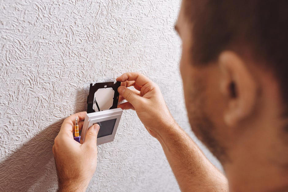 Check compatibility before you buy a smart thermostat, Unbox your new thermostat and dismount your old model, Photograph and document your wiring before disconnecting, Reconnect the wires to the correct contacts and mount the thermostat, Connect the new thermostat to Wi-Fi to start the setup , What if I'm not interested in installing my thermostat myself?
