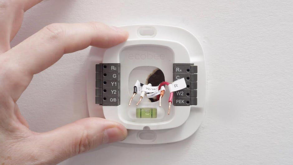 Check compatibility before you buy a smart thermostat, Unbox your new thermostat and dismount your old model, Photograph and document your wiring before disconnecting, Reconnect the wires to the correct contacts and mount the thermostat, Connect the new thermostat to Wi-Fi to start the setup , What if I'm not interested in installing my thermostat myself?