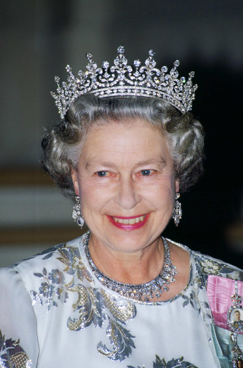 Girls of Great Britain and Ireland tiara The Cambridge Lover's Knot, The Cartier Halo Scroll tiara, The Queen Mary Diamond Bandeau tiara, The George IV State Diadem crown, Girls of Great Britain and Ireland tiara, The Poltimore tiara, The Queen Mary Fringe tiara, The Strathmore Rose tiara, The Oriental Circlet tiara, The York tiara, The Delhi Durbar tiara, The Cubitt-Shand tiara, Princess Alice's Meander tiara, Cambridge Lover's Knot tiara, Queen Alexandra's Kokoshnik tiara, The Burmese Ruby tiara, Brazilian Aquamarine Parure tiara, earrings, and necklace, The Belgium Sapphire tiara, earrings, and necklace, Meghan Markle's engagement ring, "Granny's Chips", The Delhi Durbar necklace