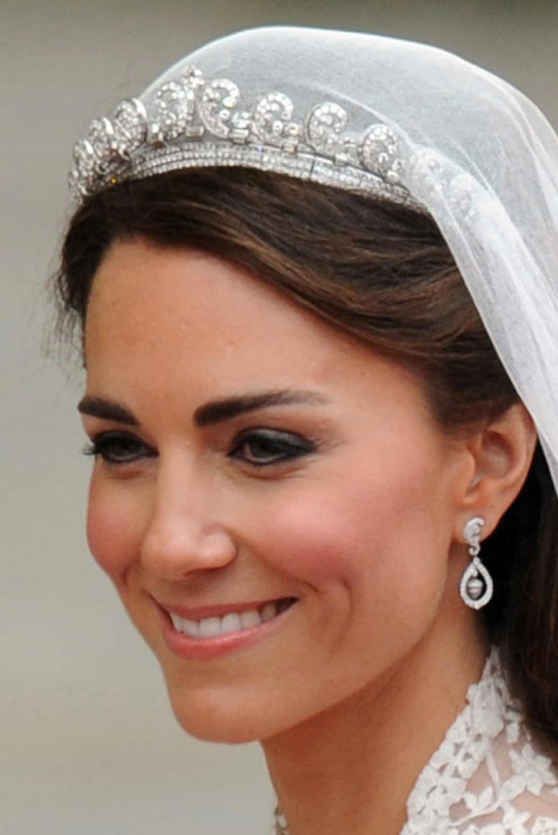 The Cartier Halo Scroll tiara The Cambridge Lover's Knot, The Cartier Halo Scroll tiara, The Queen Mary Diamond Bandeau tiara, The George IV State Diadem crown, Girls of Great Britain and Ireland tiara, The Poltimore tiara, The Queen Mary Fringe tiara, The Strathmore Rose tiara, The Oriental Circlet tiara, The York tiara, The Delhi Durbar tiara, The Cubitt-Shand tiara, Princess Alice's Meander tiara, Cambridge Lover's Knot tiara, Queen Alexandra's Kokoshnik tiara, The Burmese Ruby tiara, Brazilian Aquamarine Parure tiara, earrings, and necklace, The Belgium Sapphire tiara, earrings, and necklace, Meghan Markle's engagement ring, "Granny's Chips", The Delhi Durbar necklace