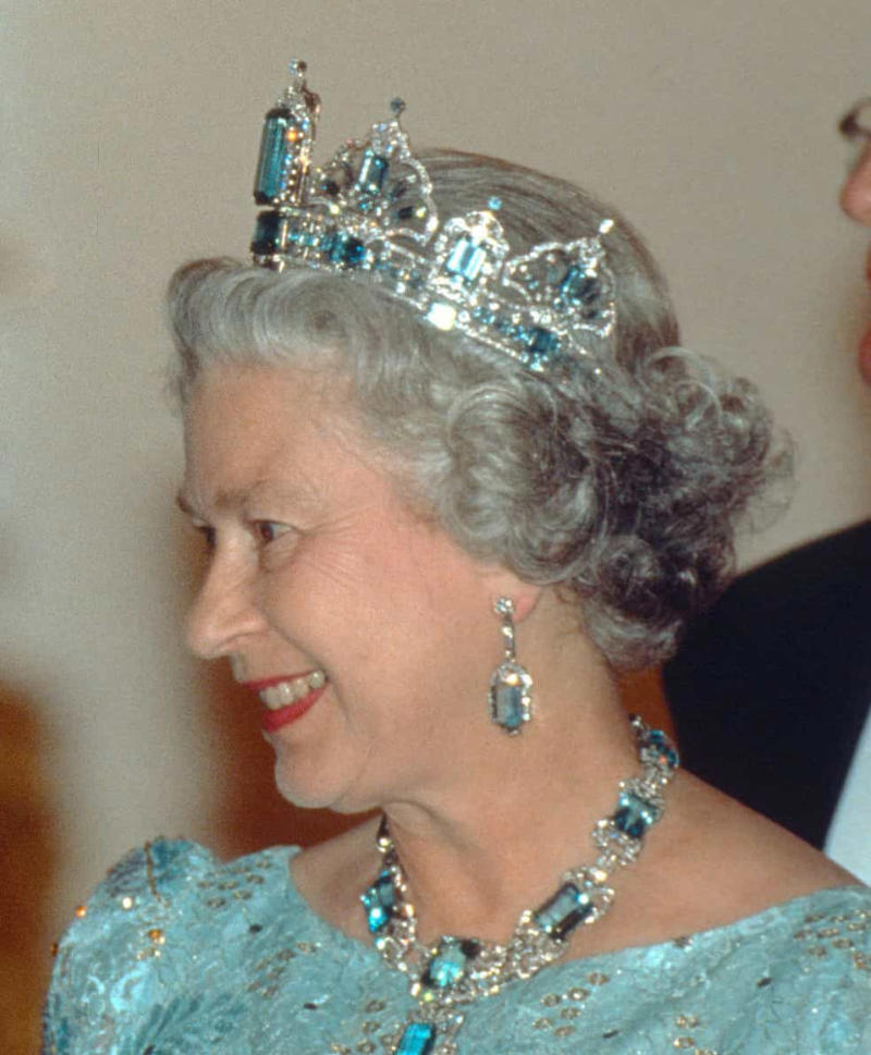 Brazilian Aquamarine Parure tiara, earrings, and necklace The Cambridge Lover's Knot, The Cartier Halo Scroll tiara, The Queen Mary Diamond Bandeau tiara, The George IV State Diadem crown, Girls of Great Britain and Ireland tiara, The Poltimore tiara, The Queen Mary Fringe tiara, The Strathmore Rose tiara, The Oriental Circlet tiara, The York tiara, The Delhi Durbar tiara, The Cubitt-Shand tiara, Princess Alice's Meander tiara, Cambridge Lover's Knot tiara, Queen Alexandra's Kokoshnik tiara, The Burmese Ruby tiara, Brazilian Aquamarine Parure tiara, earrings, and necklace, The Belgium Sapphire tiara, earrings, and necklace, Meghan Markle's engagement ring, "Granny's Chips", The Delhi Durbar necklace