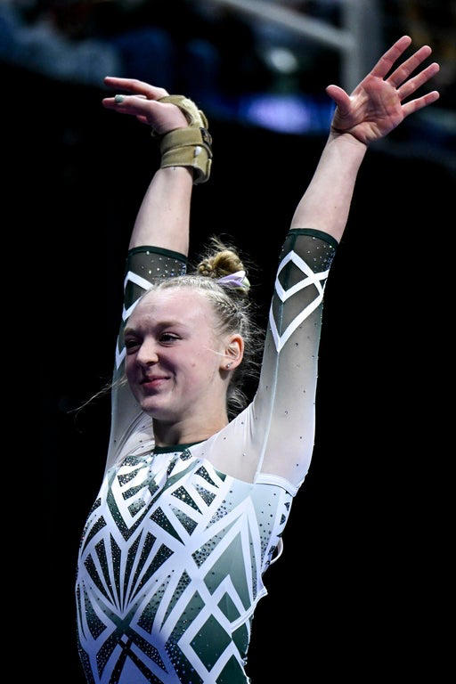 Stunning close-up photos spotlight leading collegiate women gymnasts
