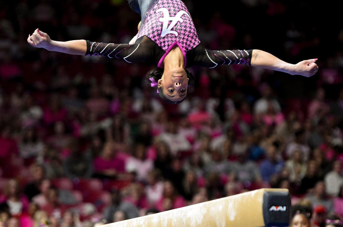Stunning close-up photos spotlight leading collegiate women gymnasts
