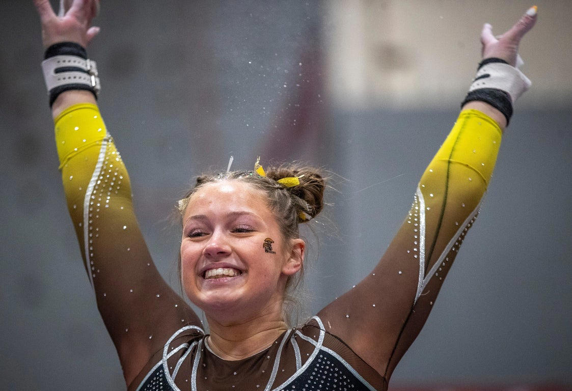 Stunning close-up photos spotlight leading collegiate women gymnasts