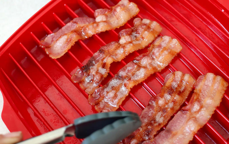 1. Bacon, 2. Cheese toastie, 4. Chocolate cookie fudge, 5. Asparagus, Seven handy microwave gadgets, 12 game-changing microwave hacks, Heat food evenly, Soften sugar, Restore old honey, Toast nuts, Make flavoured oil, Peel fruit, Chop onions, Peel garlic, Juice a lemon, Revive stale bread, Preserve herbs, Sanitise kitchen cloths