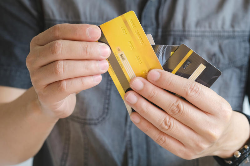 Leave your credit cards at home Use new bills, Limit the number of stores you go to, Don't make friends with the sales staff, Take a mindful break, Avoid shopping at peak times, Suck on a mint while you shop, Sleep on it before purchasing large items, Never go shopping without a list, Wear headphones when you run errands, Make yourself walk away, Say "no" to sales, unless the item is already on your list, Leave your credit cards at home, Don't shop when you’re feeling emotional, Always double check that you're getting the best value