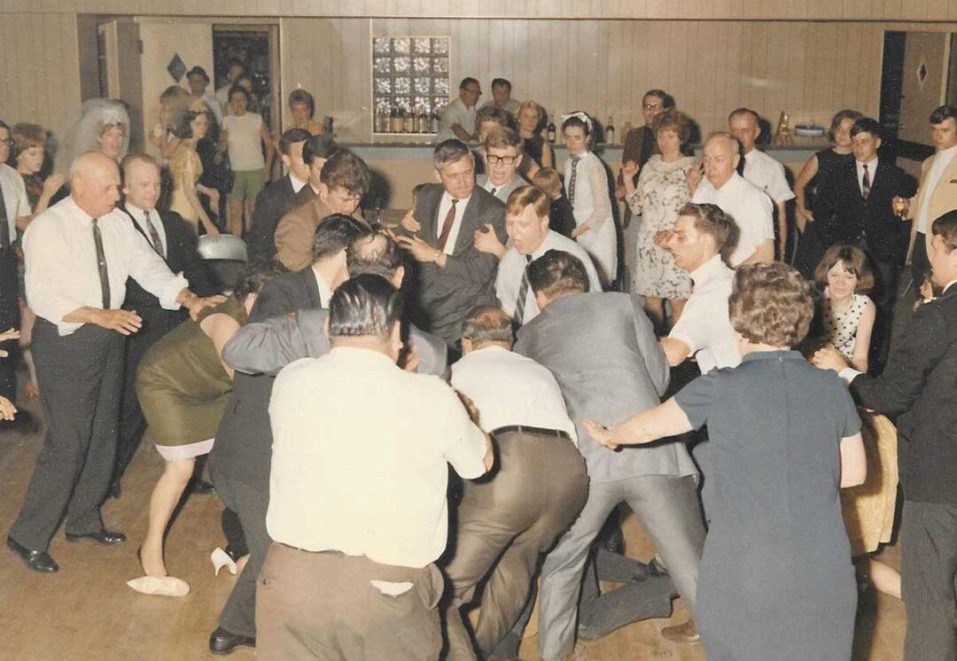 7. Anyone Know Who Won the Fight at This Reception? 1. Can We Bring Tiaras Back?, 2. ‘Do Not Disturb’ … Noted!, 3. The Style Is Impeccable, 4. Gang’s All Here (And by Here, We Mean Whitwick, England)!, 5. Do You Think They Ever Wore Those Bridesmaid Dresses Again?, 6. A 1960s Brooklyn Wedding, 7. Anyone Know Who Won the Fight at This Reception?, 8. Just Married!, 9. Now This Wedding Reception Looks Like a Good Time, 10. Lending a Hand, 11. ‘They Were Married for 60 Years’, 12. Cutting the Wedding Cake in Hawaii, 13. Sweet Ride!, 14. Putting on the Finishing Touches