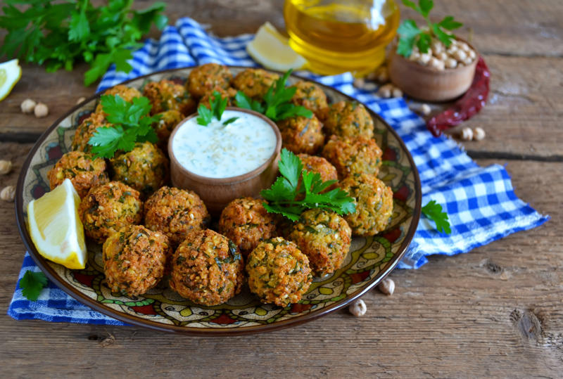 Falafel, Egypt Fish and chips, England, Tequeños, Venezuela, Spanish tortilla, Spain, Gyros, Greece, Spring rolls, China, Falafel, Egypt, Cordon bleu, Switzerland, Chivito, Uruguay, Samosa, India, Boxty, Ireland, Pirozhki, Russia, Bobotie, South Africa, Tostones, Dominican Republic, Choripán, Argentina, Grilled sardines, Portugal, Rice and beans, Brazil